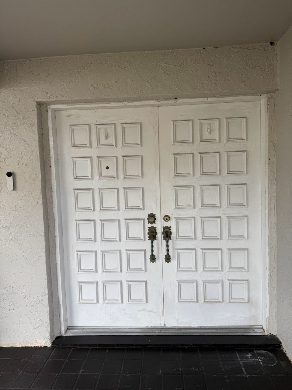 Exterior view before double entry door replacement