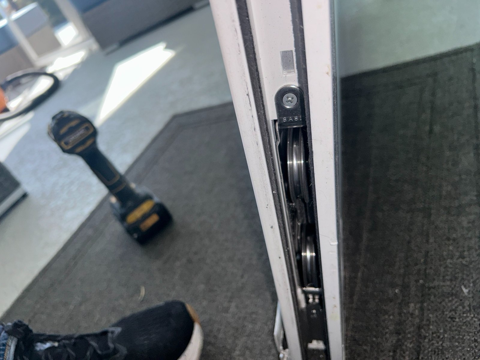 New tandem rollers installed in sliding glass door panel